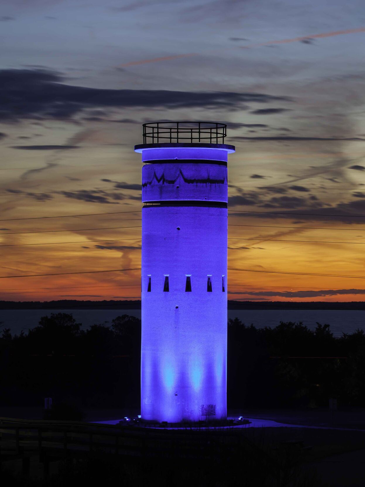 Fire control tower lit in blue